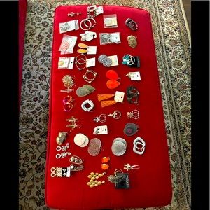 Over 40 pairs ox earrings